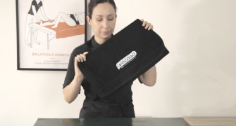 Wecasa Academy A woman folding a towel.