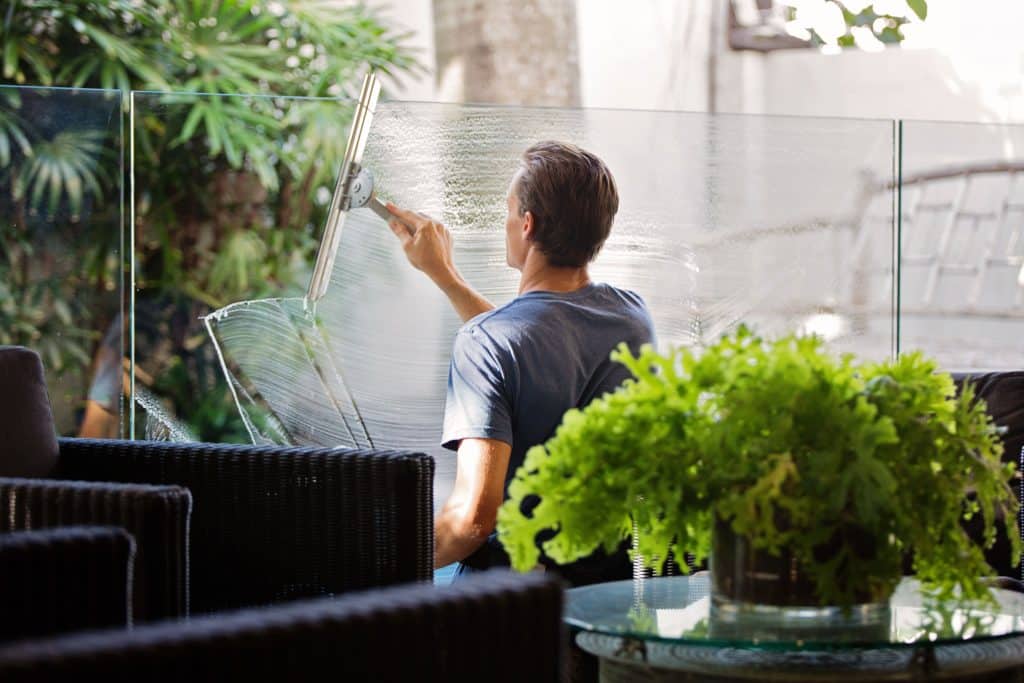 outside window cleaning - domestic cleaner cleaning outside windows - how to clean outside windows you can't reach
