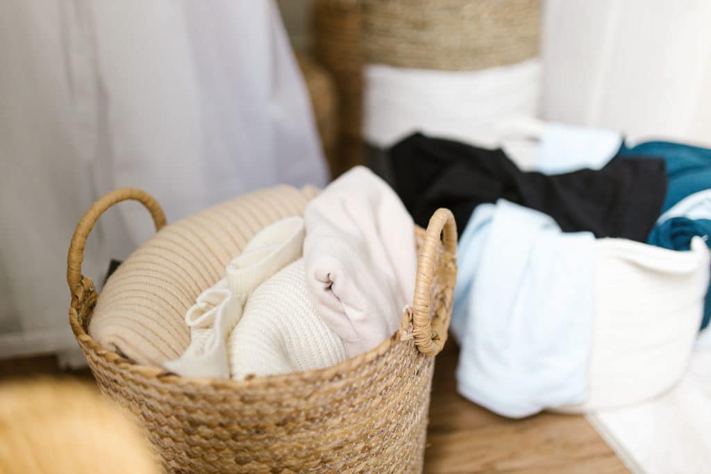 Clothing Items inside Woven Baskets - how to sort your laundry