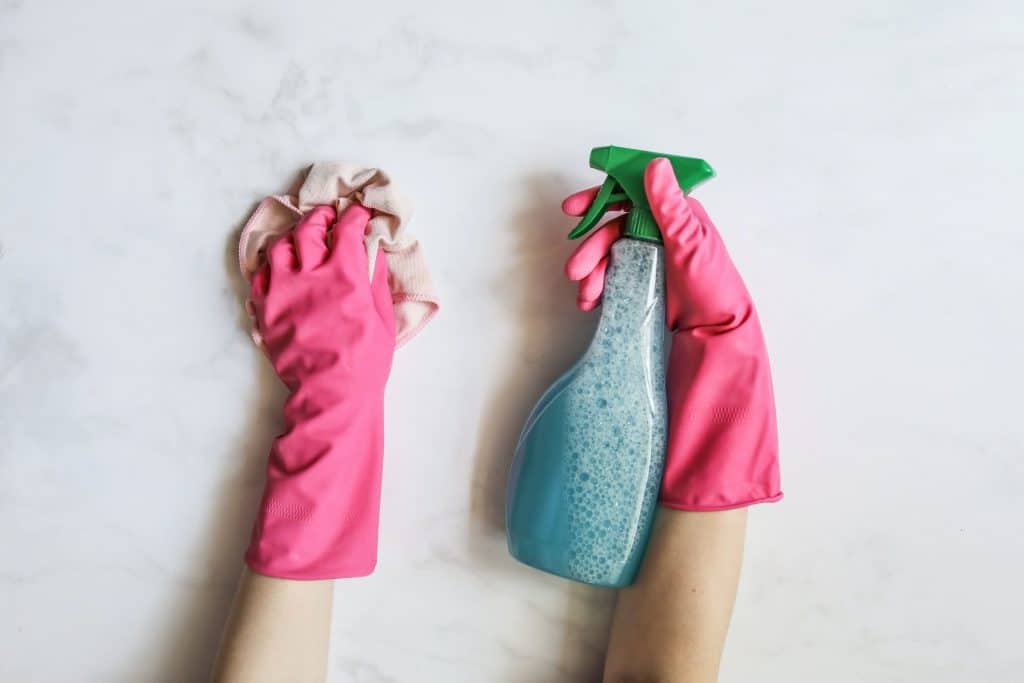 cleaning surface with pink gloves - How to remove permanent marker