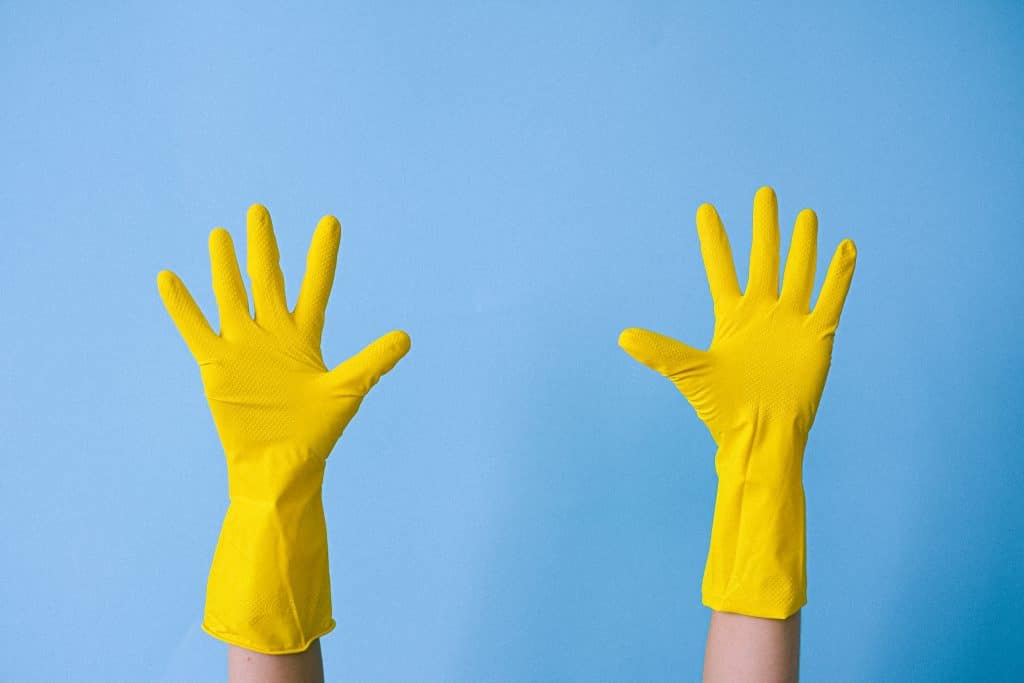 Yellow rubber gloves- House Cleaning Guide