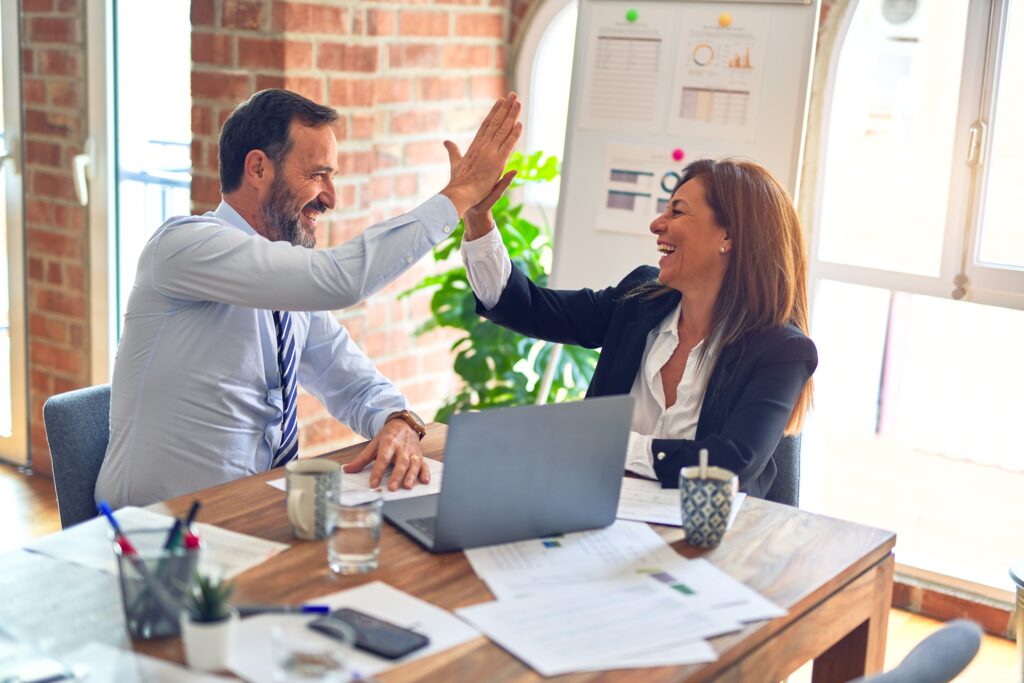 person working in a high-fiving