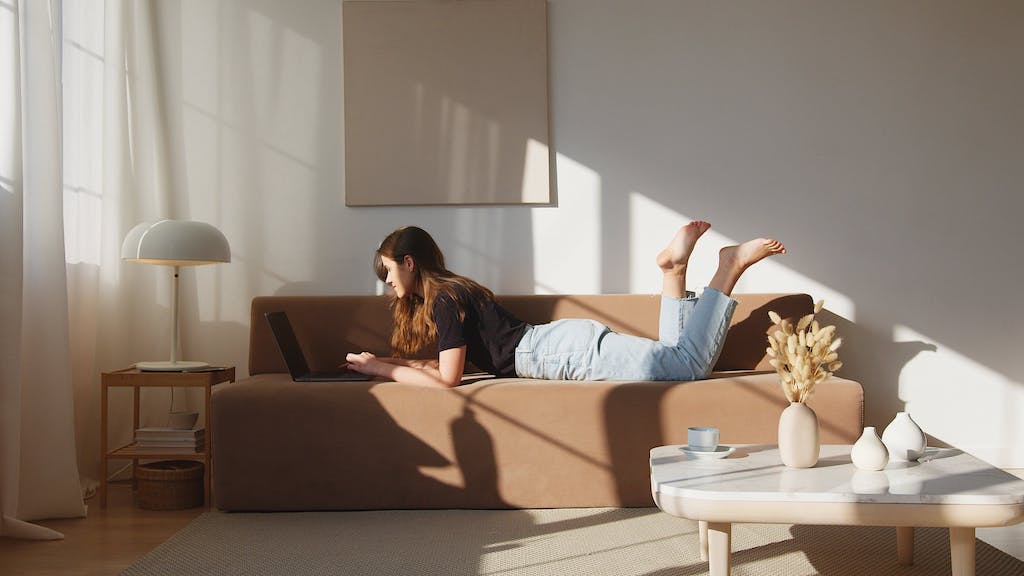 stress-free woman on sofa