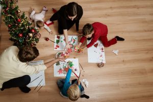 children making Christmas village