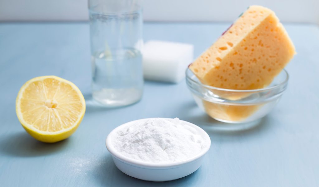 Eco friendly natural cleaners products. Vinegar, soda and lemon. Bicarbonate.