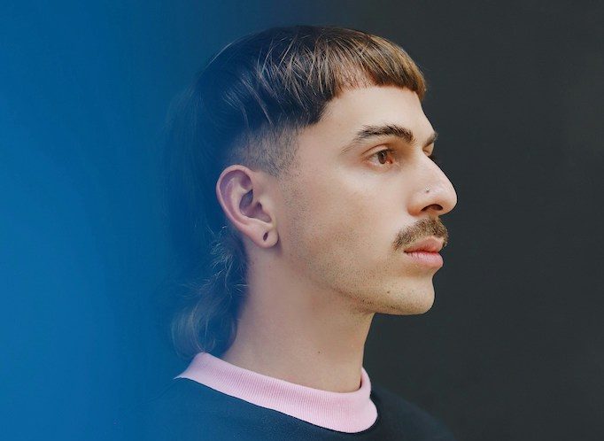 Man with mullet haircut