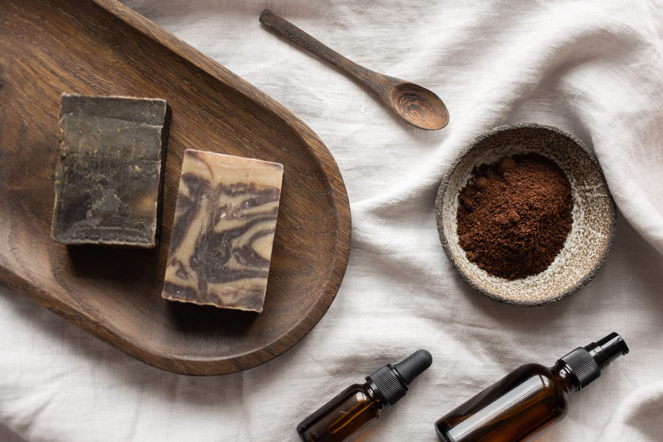 handmade soap and bowl with coffee placed on table-how to get rid of the smoke smell in your house