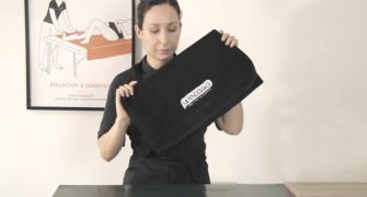 Wecasa Academy A woman folding a towel.